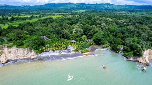 an aerial view of an island in the ocean at Hosteria Cumilinche in Same