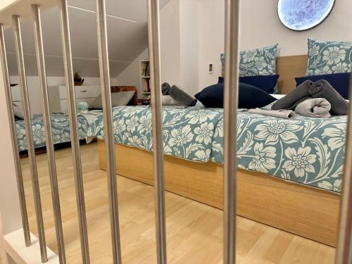 a bed with two teddy bears laying on it at Tanis Ocean Loft in Martinšćica