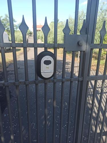 a locked gate with a lock on it at La Circumetnea Home in Catania