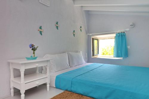 Postel nebo postele na pokoji v ubytování Villa Potami