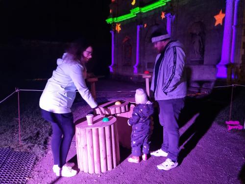 a woman and a man standing next to a small child at Beach View Couples Retreat Aberavon Beach Direct Seafront panoramic Sea Views large driveway parking in Port Talbot