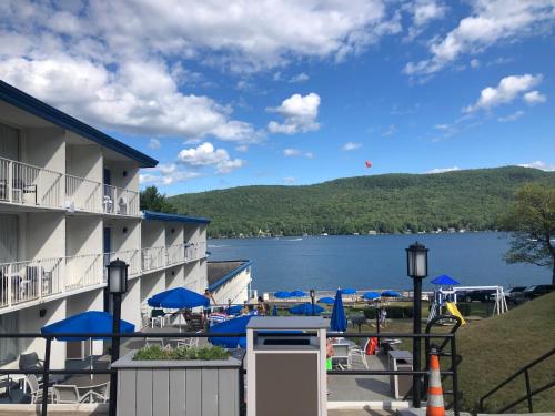 a view of the lake from the balcony of a hotel at Lakefront Terrace Resort in Lake George