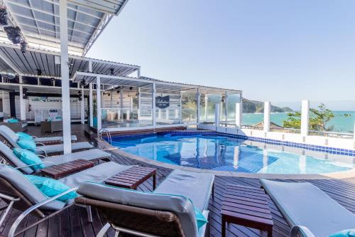 a large swimming pool on a cruise ship at Residencial Brava Club Exclusive in Búzios