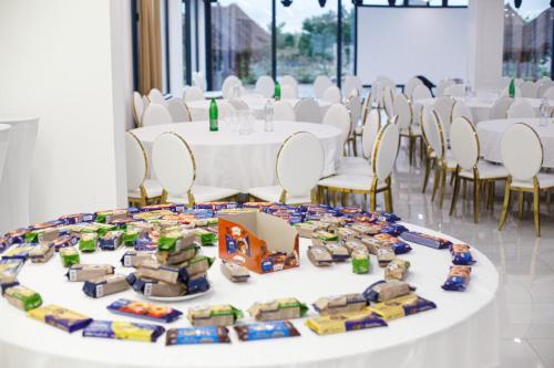 a table set up for a party with cars on it at S Club Resort Hotel Aqua Park and Spa in Belgrade