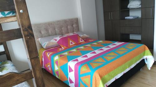 Postel nebo postele na pokoji v ubytování Apartamento Moniquira