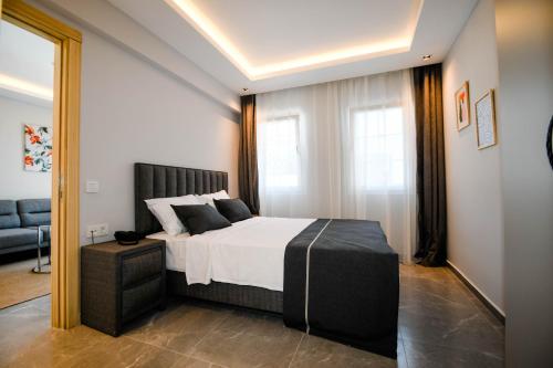 Ένα ή περισσότερα κρεβάτια σε δωμάτιο στο Swan Boutique Hotel