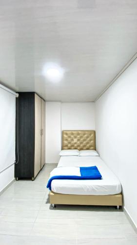 Katil atau katil-katil dalam bilik di Apartahotel 222 apartamento 402