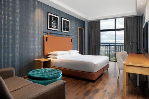 Ένα ή περισσότερα κρεβάτια σε δωμάτιο στο Four Points by Sheraton Kigali