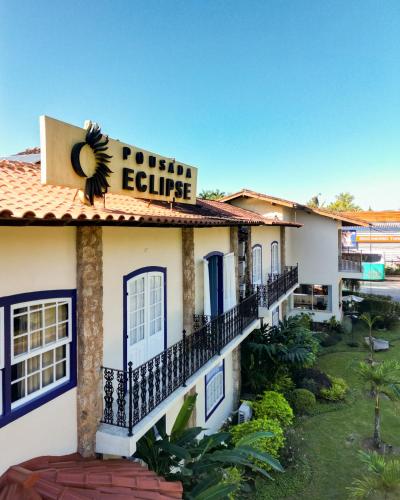 a resort building with a sign that reads potrero eclipse at Pousada Eclipse Paraty in Paraty