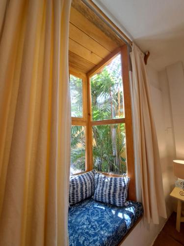 Postel nebo postele na pokoji v ubytování Yellow House Hostel B&B