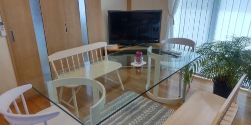 Μια τηλεόραση ή/και κέντρο ψυχαγωγίας στο Guest Room安曇野2466