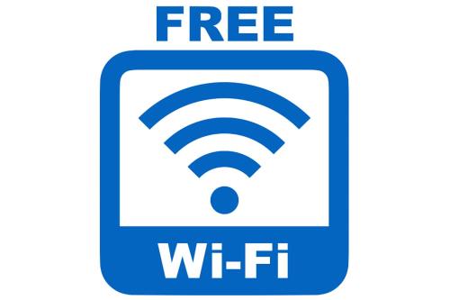 a blue sign with a wifi symbol on it at Hotel The Centre Utsunomiya in Utsunomiya