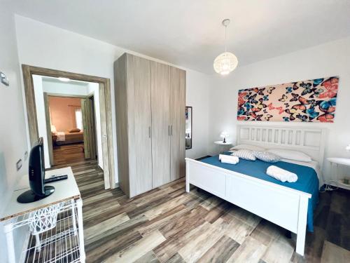 Ένα ή περισσότερα κρεβάτια σε δωμάτιο στο Casa di Ivana