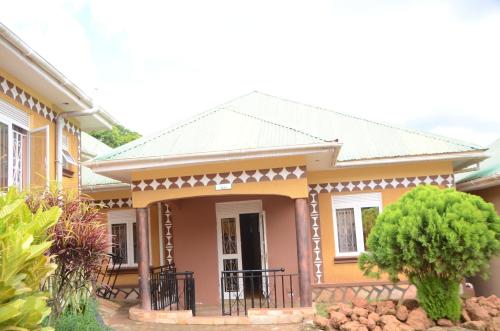 a house in the suburbs of melbourne at WAMALA RESORT HOTEL SSESE in Kalangala