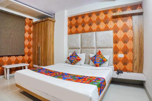 Postel nebo postele na pokoji v ubytování FabHotel The Pannies