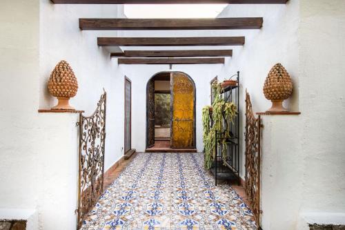 an entrance to a house with a tile floor at Villa Grimodi in Caronia Marina