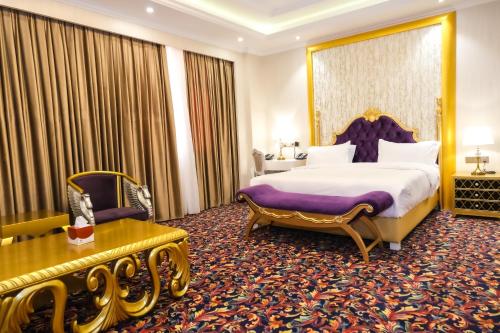 Postel nebo postele na pokoji v ubytování Move npic Zenat al Hayat Hotel