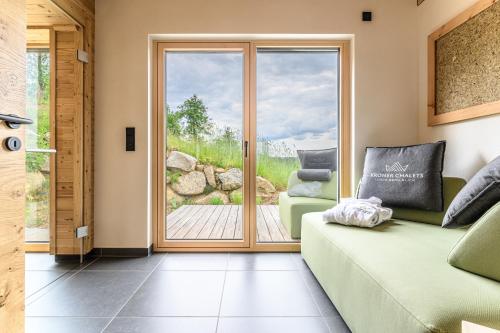 Posezení v ubytování Kroner Chalets