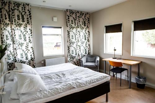 Postel nebo postele na pokoji v ubytování Spångholmen Bed & Breakfast AB