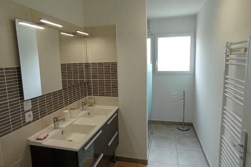 Ένα μπάνιο στο À l'ombre des Tilleuls