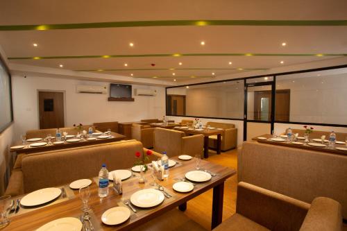 Zona de estar de Hotel Keerthi
