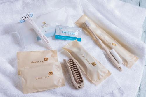 a group of products sitting on a white blanket at Hotel Nikko Kumamoto in Kumamoto