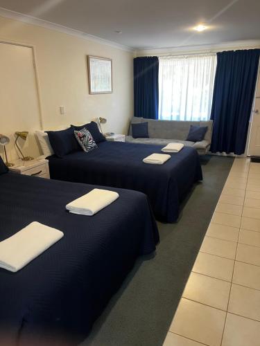 Postel nebo postele na pokoji v ubytování Emu Point Motel