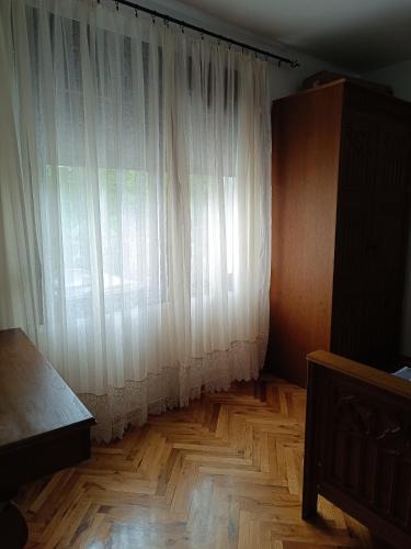 Ένα ή περισσότερα κρεβάτια σε δωμάτιο στο Vila Bianca Srebrno jezero