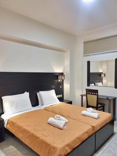 מיטה או מיטות בחדר ב-Vita Blu Apart/Hotel