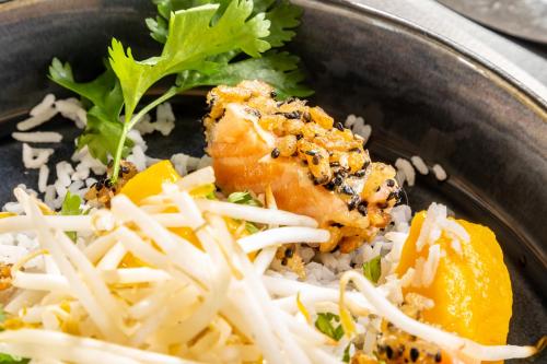 a bowl of food with rice and cheese at Novotel Bourges in Bourges