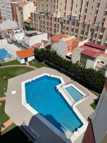 an overhead view of a swimming pool on a building at Estudio Oceanview Torre del Mar in Torre del Mar