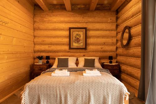 Posteľ alebo postele v izbe v ubytovaní Chata Odskocznia - balia, sauna