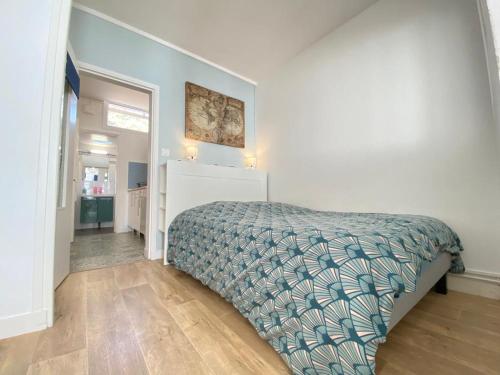 Ένα ή περισσότερα κρεβάτια σε δωμάτιο στο BEACH House CLODINET