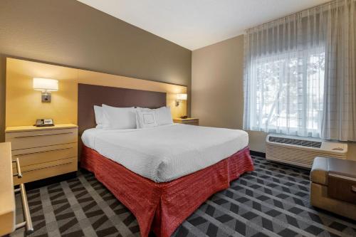 Postel nebo postele na pokoji v ubytování TownePlace Suites by Marriott Vincennes