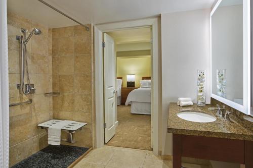 a bathroom with a sink and a shower at The Westin St. John Resort Villas in Saint John