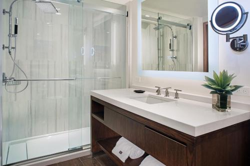 a bathroom with a sink and a shower at The Westin St. John Resort Villas in Saint John