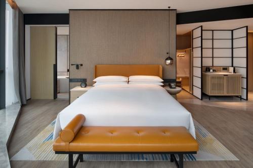 Postel nebo postele na pokoji v ubytování Sheraton Xi'an Chanba