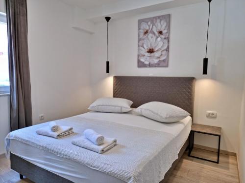 Ένα ή περισσότερα κρεβάτια σε δωμάτιο στο Apartments Zorica