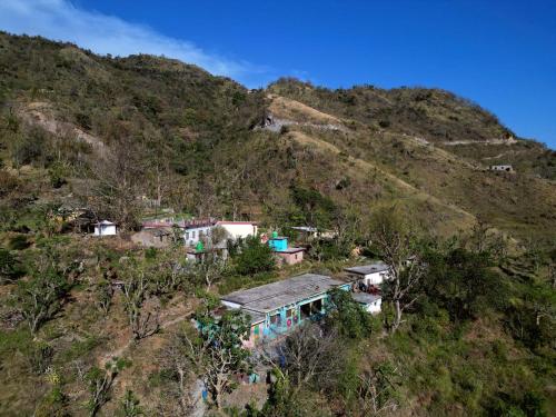 an aerial view of a house on a hill at Clan Boho in Rishīkesh