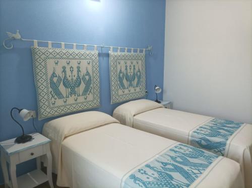 Postel nebo postele na pokoji v ubytování Hotel Made