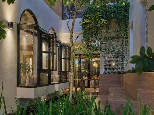 Zahrada ubytování The Motifs Eco Hotel - SHA Extra Plus