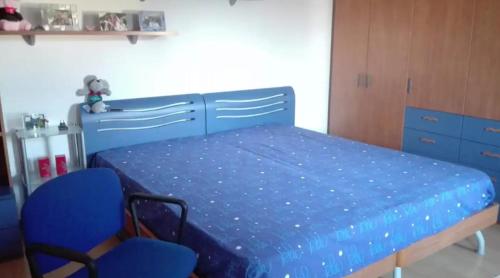 Giường trong phòng chung tại Glicine delle Dolomiti