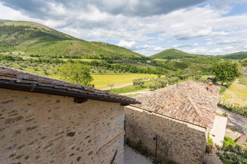 a view of the hills from a farm house at Borgo Colognola - Dimora Storica in Cenerente