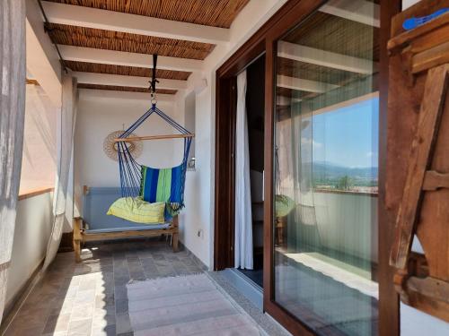 Balkón nebo terasa v ubytování Lu Canaleddu Room