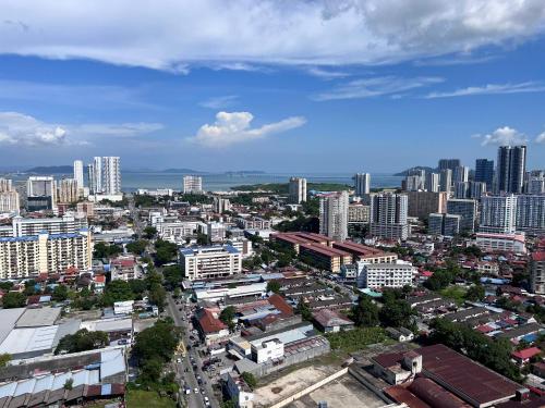 an aerial view of a city with tall buildings at Georgetown#Amazing SkyPool#Modern & Elegant Suite# in George Town