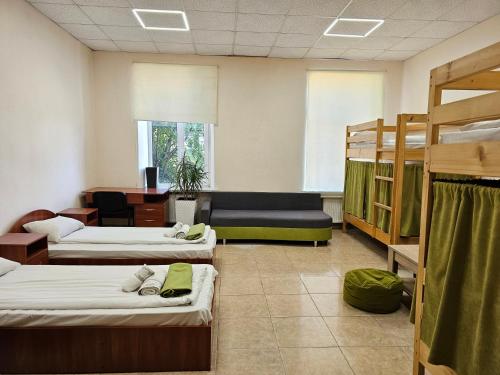 Postel nebo postele na pokoji v ubytování Coin Apartments & Poshtel