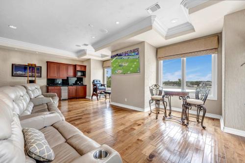 a living room with a couch and a table at The Villa on Matern New Listing in Horseshoe Bay