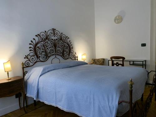 Cama ou camas em um quarto em Charming renovated apartment in Turin- 2 Bathrooms