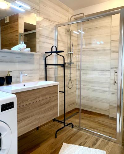 a bathroom with a shower and a sink at SUNADOR - Adults Only in Crikvenica