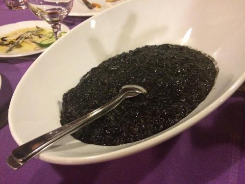 a white bowl of food with a spoon in it at Galeb Bed and Breakfast in Baćina